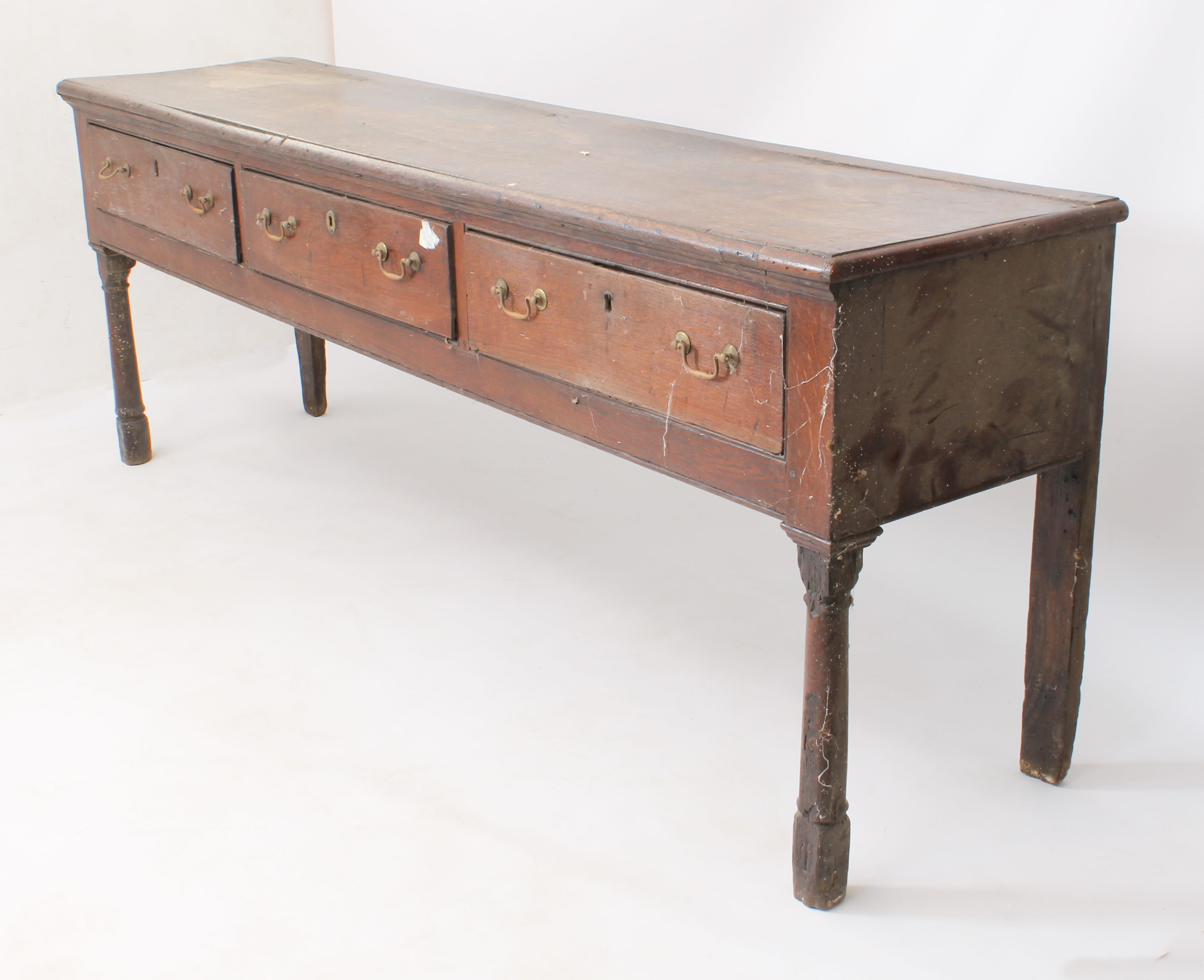 A late-18th century oak dresser base - the boarded top with applied half-round edge moulding, over - Image 2 of 4