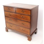 A George III cross-banded mahogany straight-front chest of drawers - the moulded, satinwood banded
