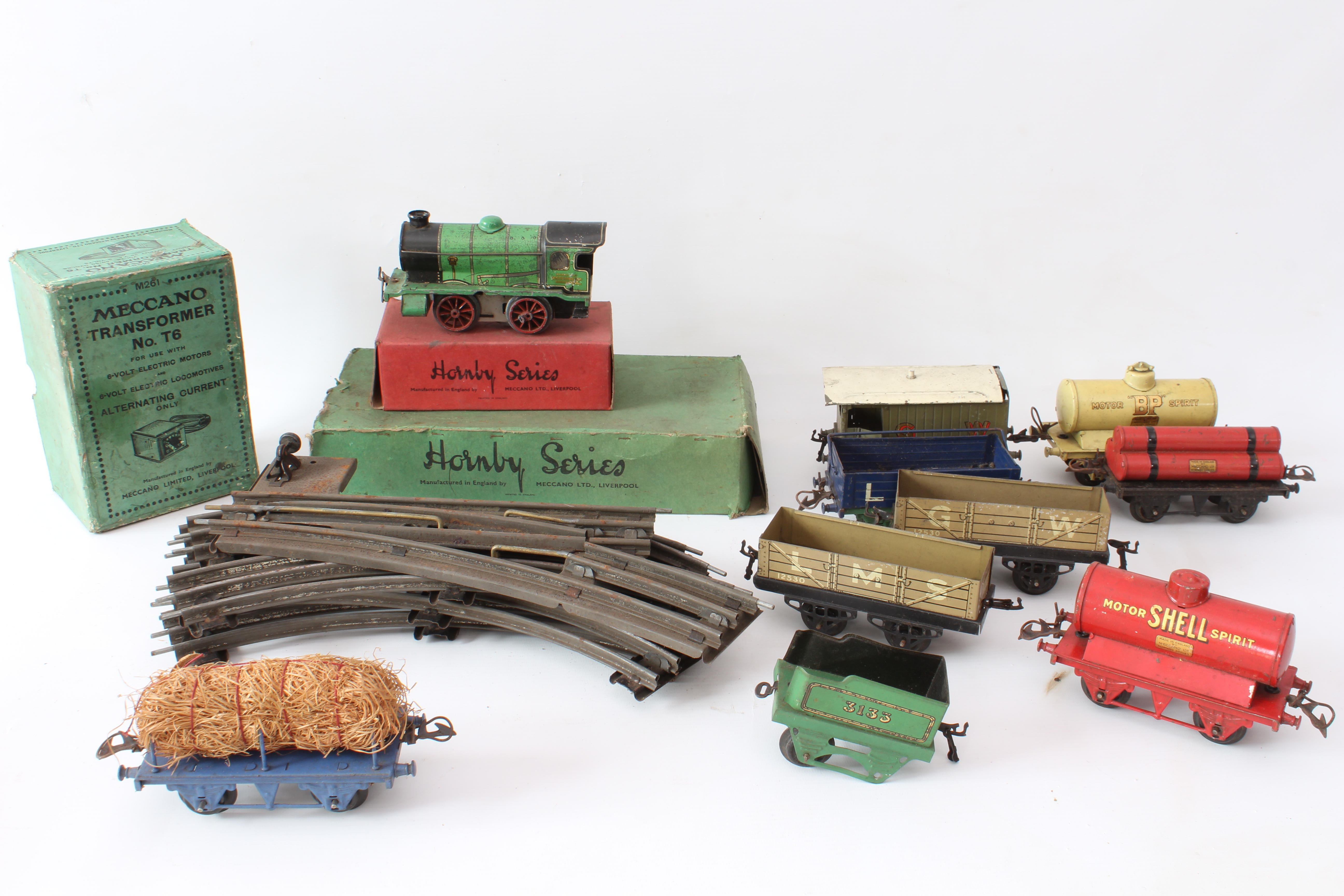 A quantity of early 20th century Hornby and Meccano train rolling stock including Track Shell