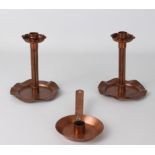 A pair of Arts & Crafts style copper candlesticks - early 20th century, with cluster column stems