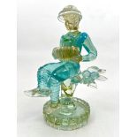 A Murano glass figure of a seated accordion player by Ercole Barovier for Ferro Barovier Toso - in