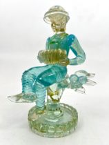 A Murano glass figure of a seated accordion player by Ercole Barovier for Ferro Barovier Toso - in