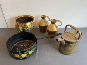 Five pieces of brass and other metalware: a pair of Edwardian brass pitchers by Henry Loveridge &