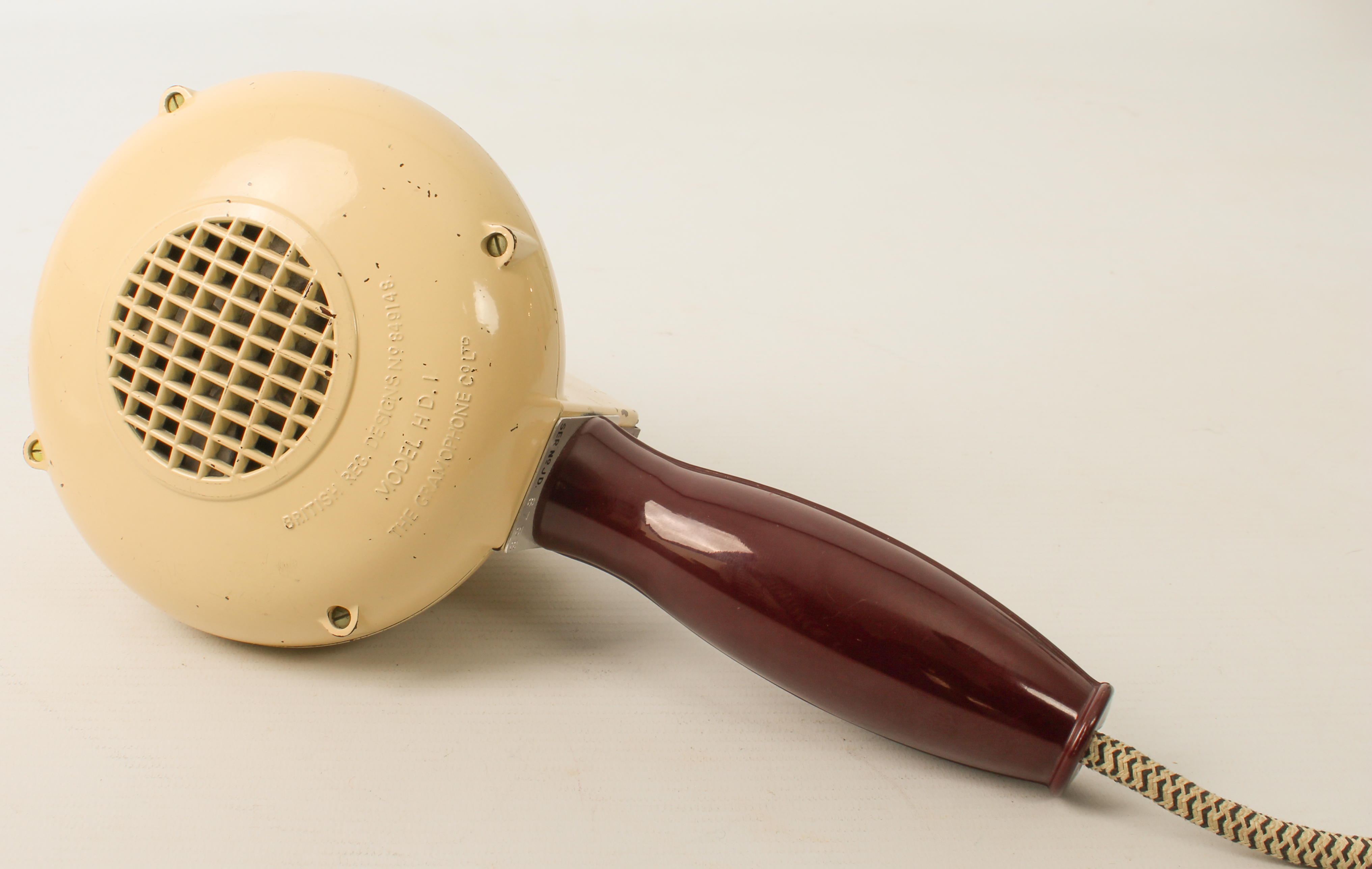 A vintage bakelite hairdryer by the Gramophone Co. Ltd. HMV - model HD1, 1930s-40s, maroon