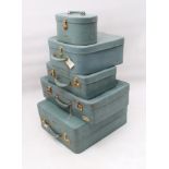 A five-piece set of vintage 1950s Antler luggage in turquoise vinyl - all with quilted fabric