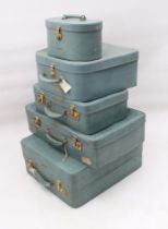 A five-piece set of vintage 1950s Antler luggage in turquoise vinyl - all with quilted fabric