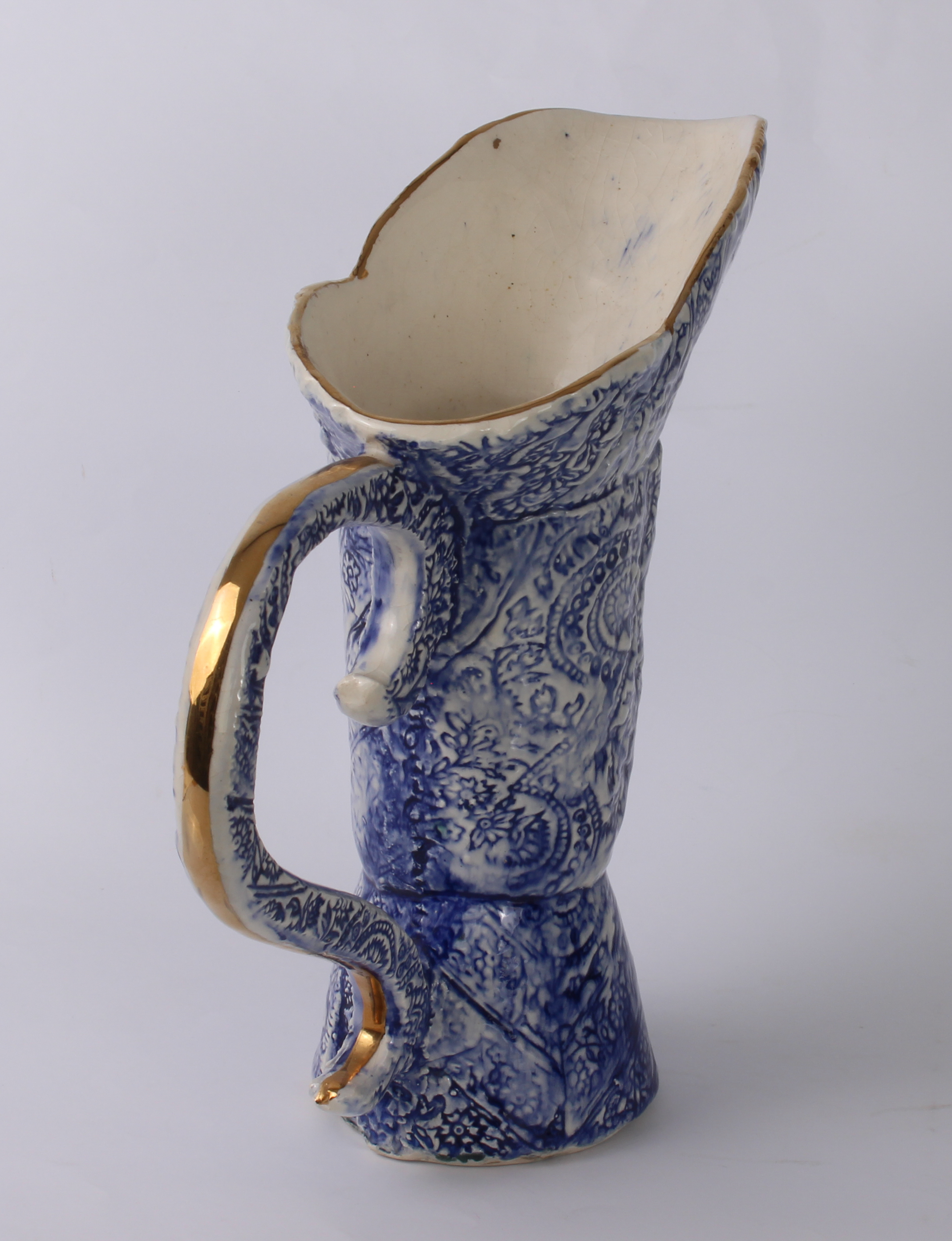 An unusual Continental blue and white pottery ewer - with three-part boot-shaped body and S-scroll - Image 3 of 4
