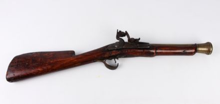 A 19th century blunderbus - alterations, with 11in flared brass barrel, flintlock action, brass