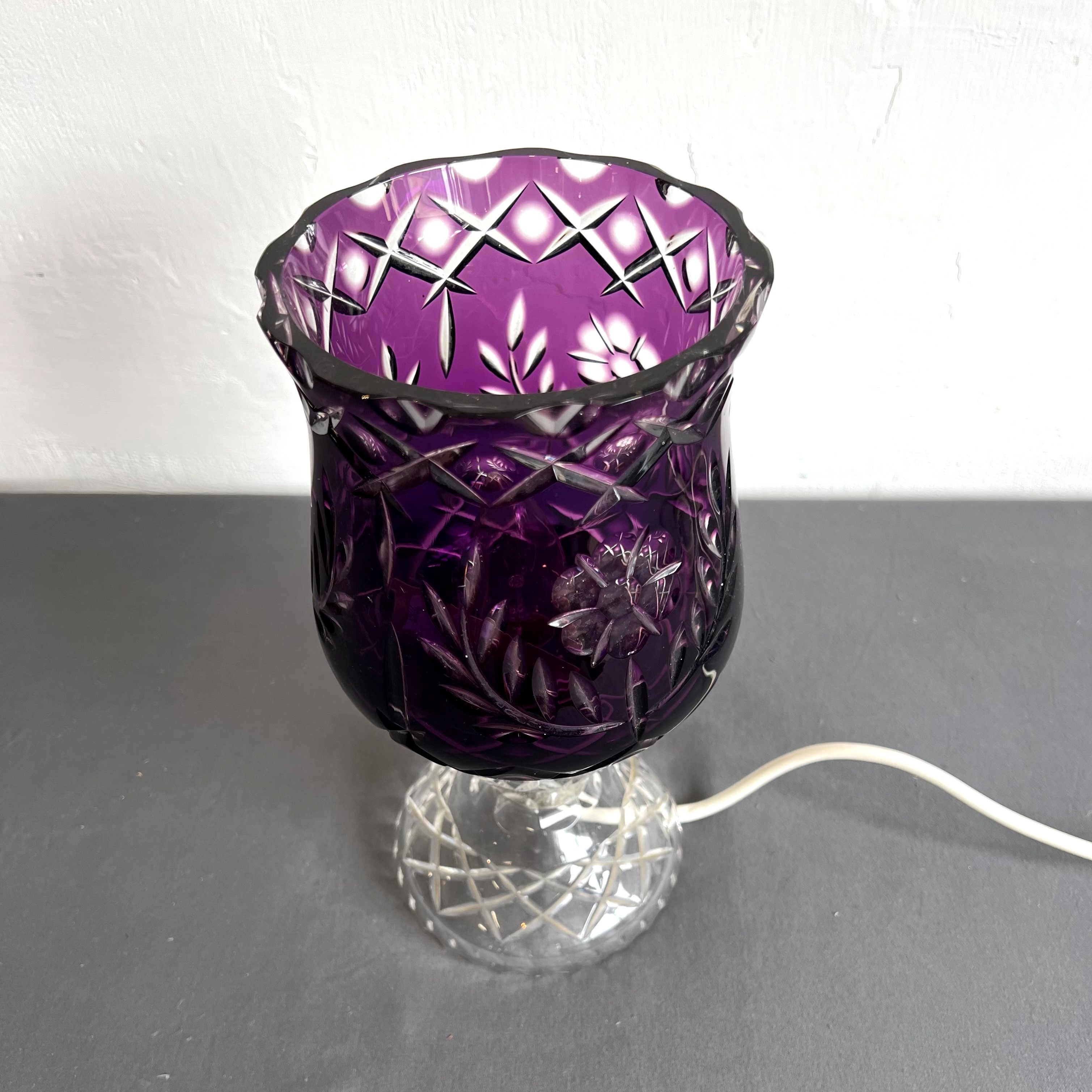 An amethyst cased glass table-lamp, possibly Scottish - the tulip-shaped shade with floral, diamond, - Image 2 of 2