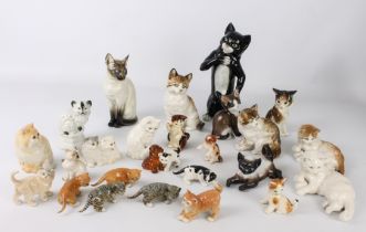 A large group of porcelain and china figures of cats and kittens by Hutschenreuther, Ens and other