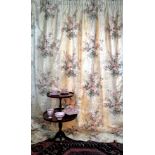 A pair of handmade curtains in ‘Plumbago Bouquet’ cotton chintz by Colefax and Fowler, together with