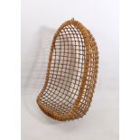 A retro 1970s cane and wicker hanging egg-shaped chair - with iron hanging hook and alternative