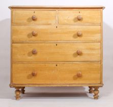 A Victorian scumble painted pine chest of drawers - the moulded top over two short and three long