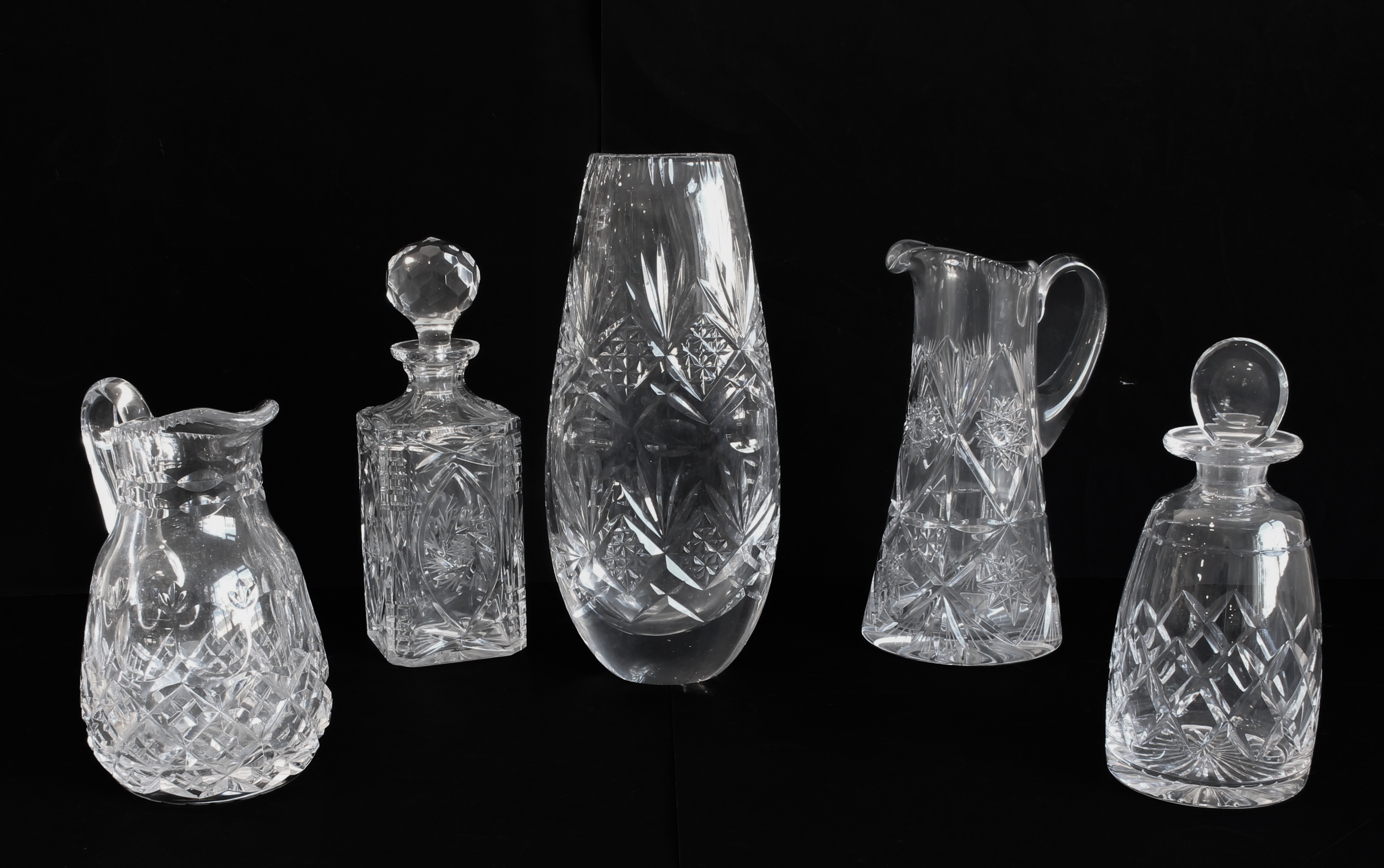 A collection of cut glass and crystal to include a vase, fruit bowl, two decanters, jugs, and - Image 2 of 4