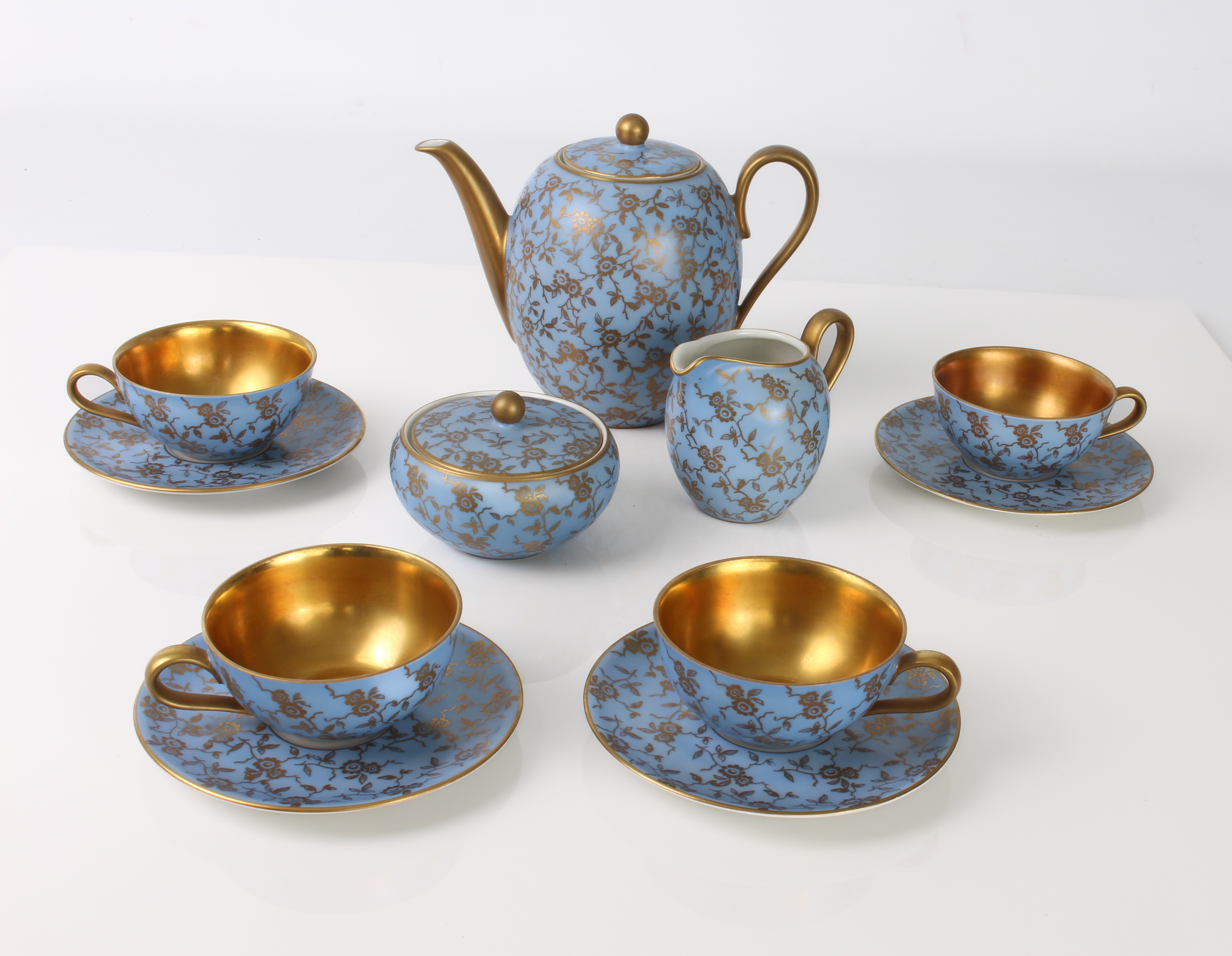 A German porcelain coffee set by Rhenania of Duisdorf - 1920s-30s, decorated with overall gilt