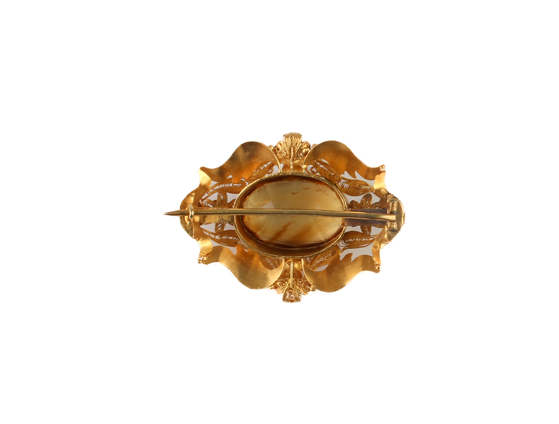 A mid-19th century 18ct gold and citrine brooch - the 21.5 x 14.5mm oval, mixed cut citrine - Image 3 of 4