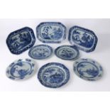 Eight Chinese export porcelain blue and white plates and octagonal platters - late 18th / early 19th