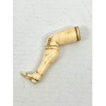 An early 19th century prisoner of war carved-bone novelty pipe-tamper - in the form of a shapely