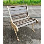 A garden chair with cast iron frame and slatted wooden seat and back - 66cmW x 64cmD x 76cmH.