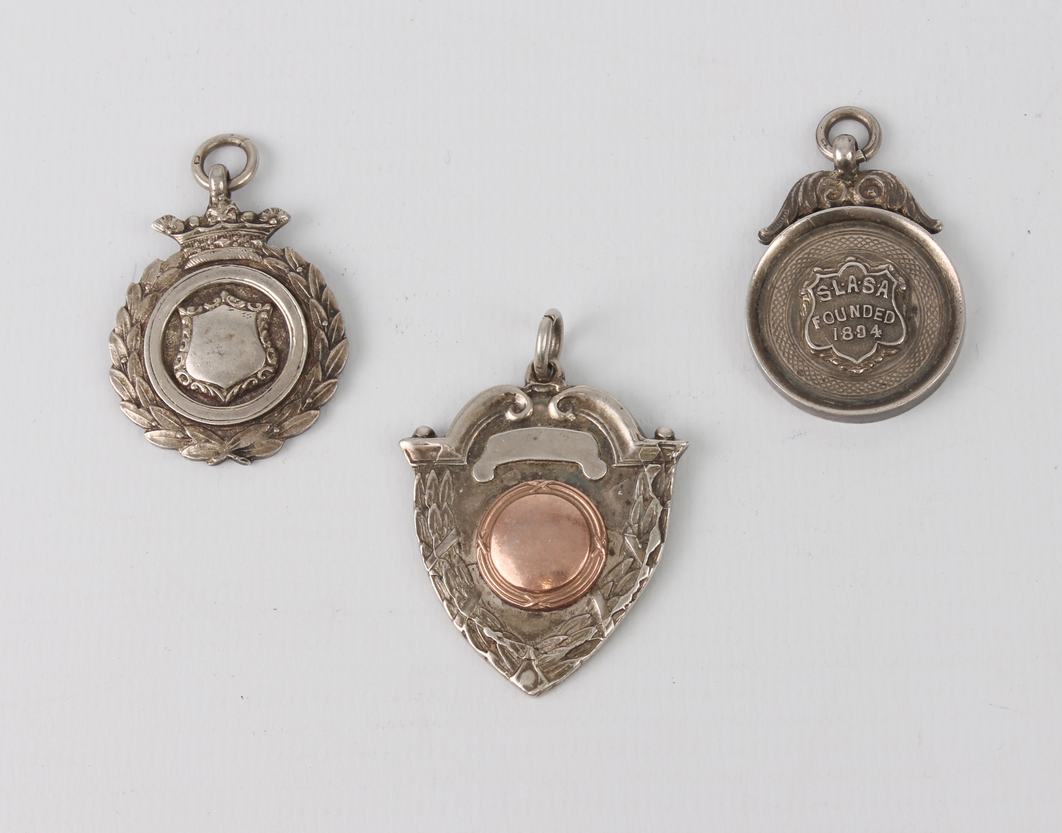 Three hallmarked silver football medals (KPSFL League Winners 1938-39, 1st Division W Lewigton);