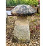 A Cotswold stone staddle stone with substantial mushroom shaped top - the top: 47cm diameter x