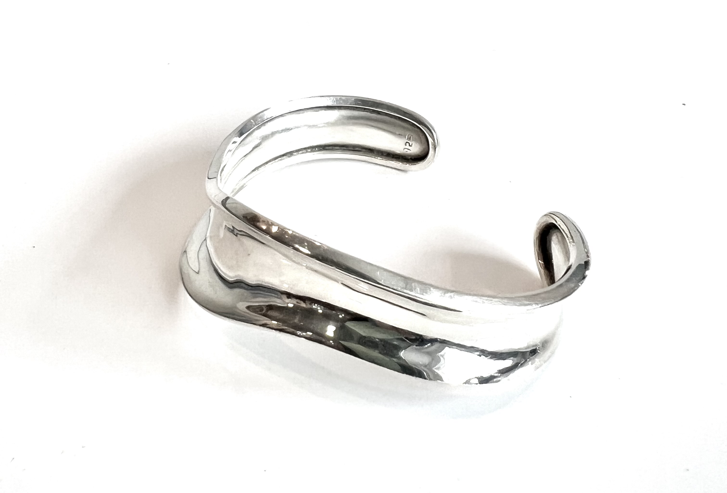 Three sterling silver modernist bangles of wavy form - one solid and the other two of pierced - Image 4 of 4