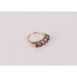 A 9ct gold and amethyst five stone Victorian-style ring - hallmarked London 1973, with five