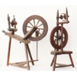 Two antique spinning wheels - some missing parts.