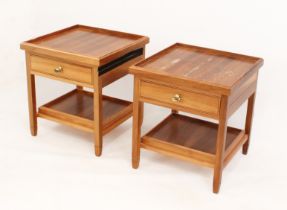 A pair of modern hardwood bedside tables - the square tray top over a frieze drawer and tray