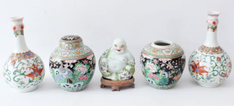 Five pieces of 20th century Chinese porcelain: a pair of garlic neck bottle vases, painted in the