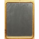 A small gilt framed mirror - of rounded, rectangular form with shot sight edge, mid-20th century, 43