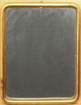 A small gilt framed mirror - of rounded, rectangular form with shot sight edge, mid-20th century, 43