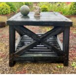 An outdoor timber table - in a/f condition, some rot and loose joints, one side stretcher