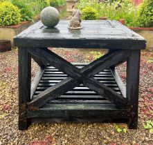 An outdoor timber table - in a/f condition, some rot and loose joints, one side stretcher