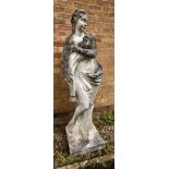 A composite stone female garden statue - the 156cm high.