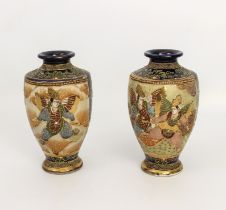 A pair of Japanese Satsuma earthenware vases - 1920s-30s, of baluster form, painted with two