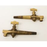 A pair of antique heavy brass 'The "Canto"' barrel taps by Gaskell & Chambers Ltd. - 23.2 cm long.