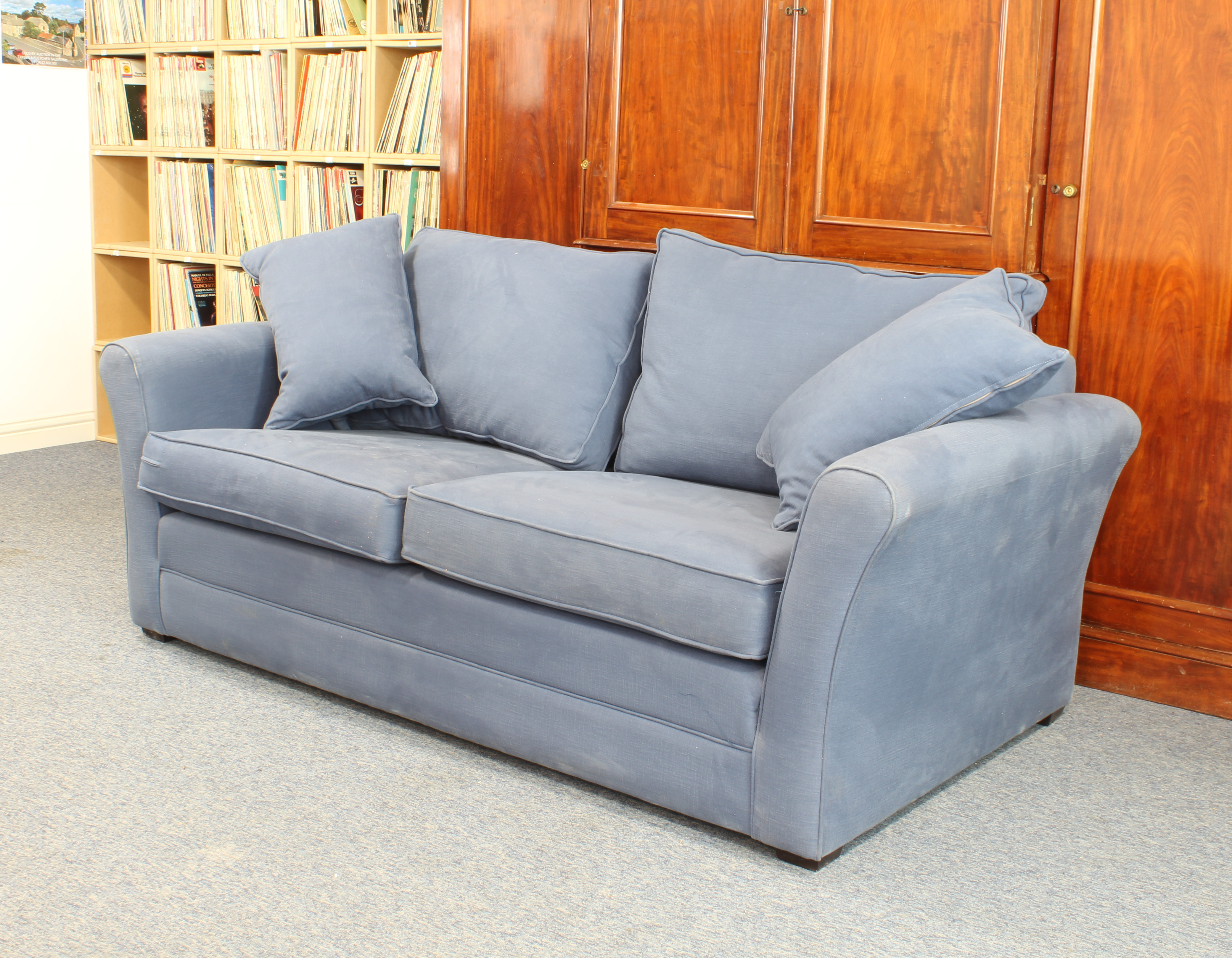 A Barker and Stonehouse 'Berkeley' three-seater sofa - circa 2022, in plain blue upholstery, on - Image 3 of 3