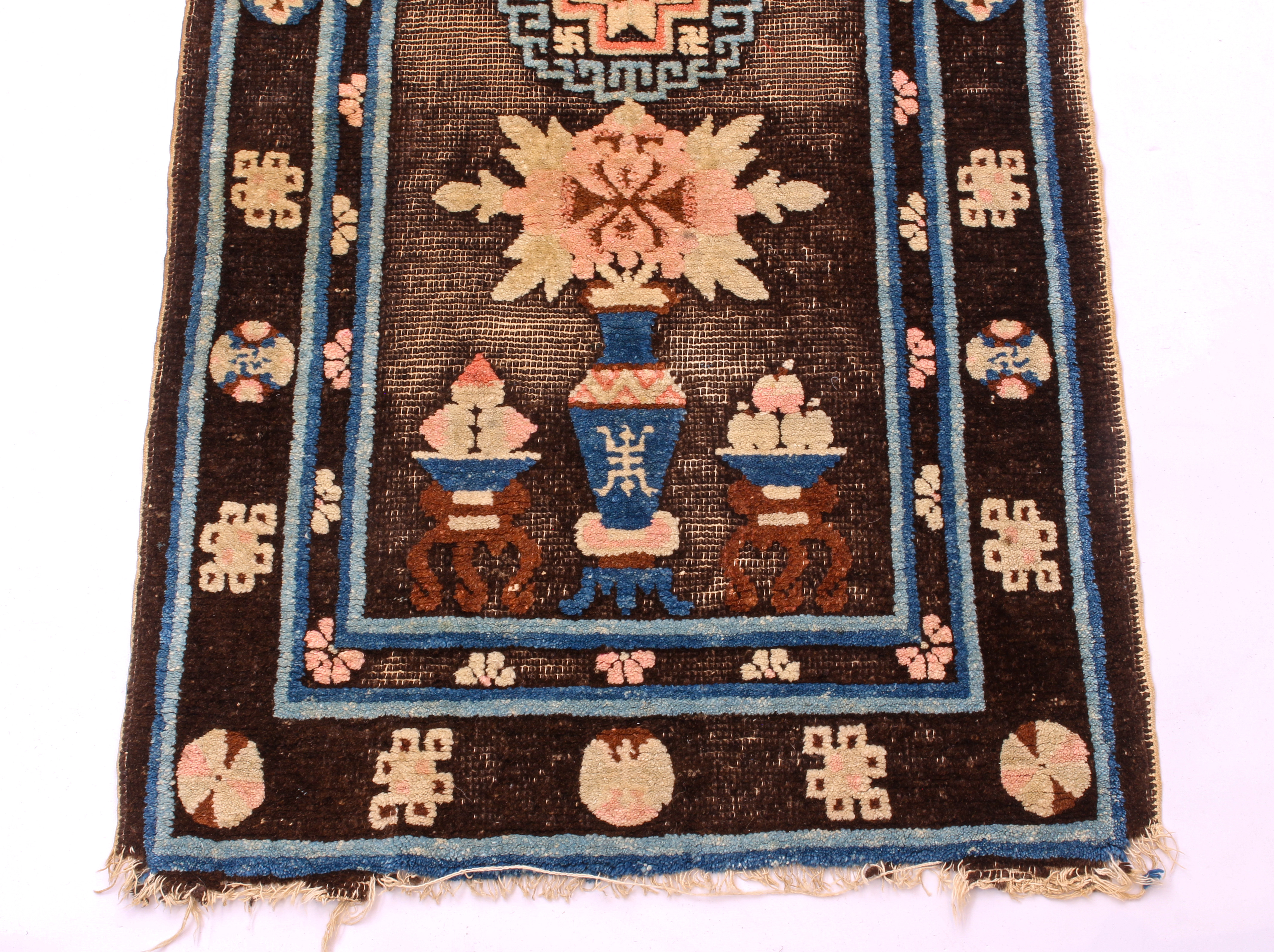 A 1920s-30s Chinese wool rug - decorated with vases and precious objects on a Royal blue ground, - Image 2 of 5