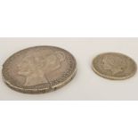 An 1898 silver 2½ gulden (.945) and an 1893 peseta (.835)