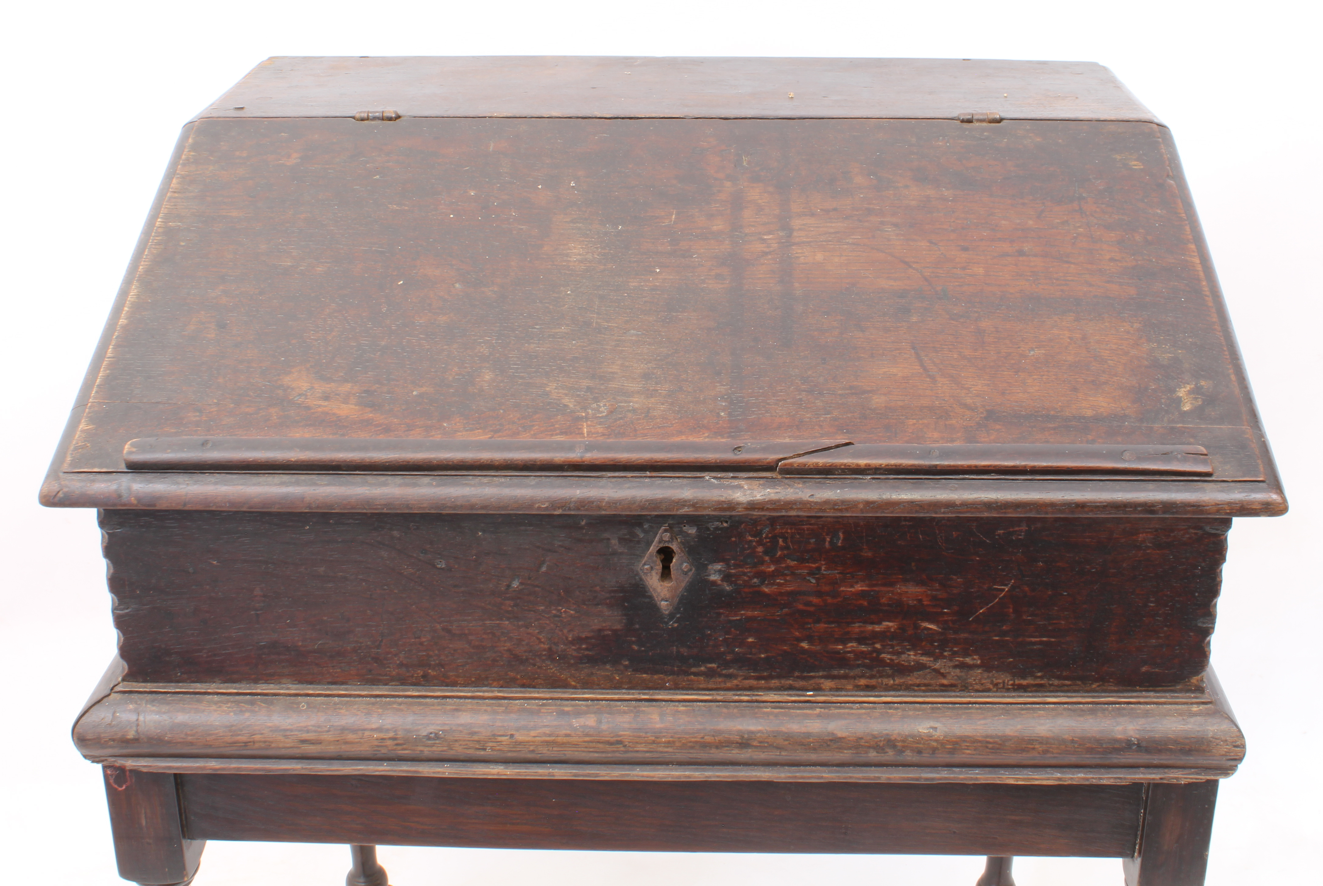 A late-18th century oak clerk's desk - the hinged lid with book-rest, enclosing a simply fitted - Image 2 of 4