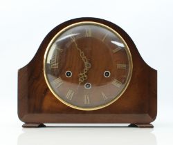 A walnut-cased Smiths mantel clock - 1940 or 1950s, the walnut dial with applied brass Roman