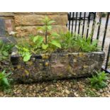 A composite stone rectangular trough - decorated with a figural frieze, 70 x 35cm x 23cm high.