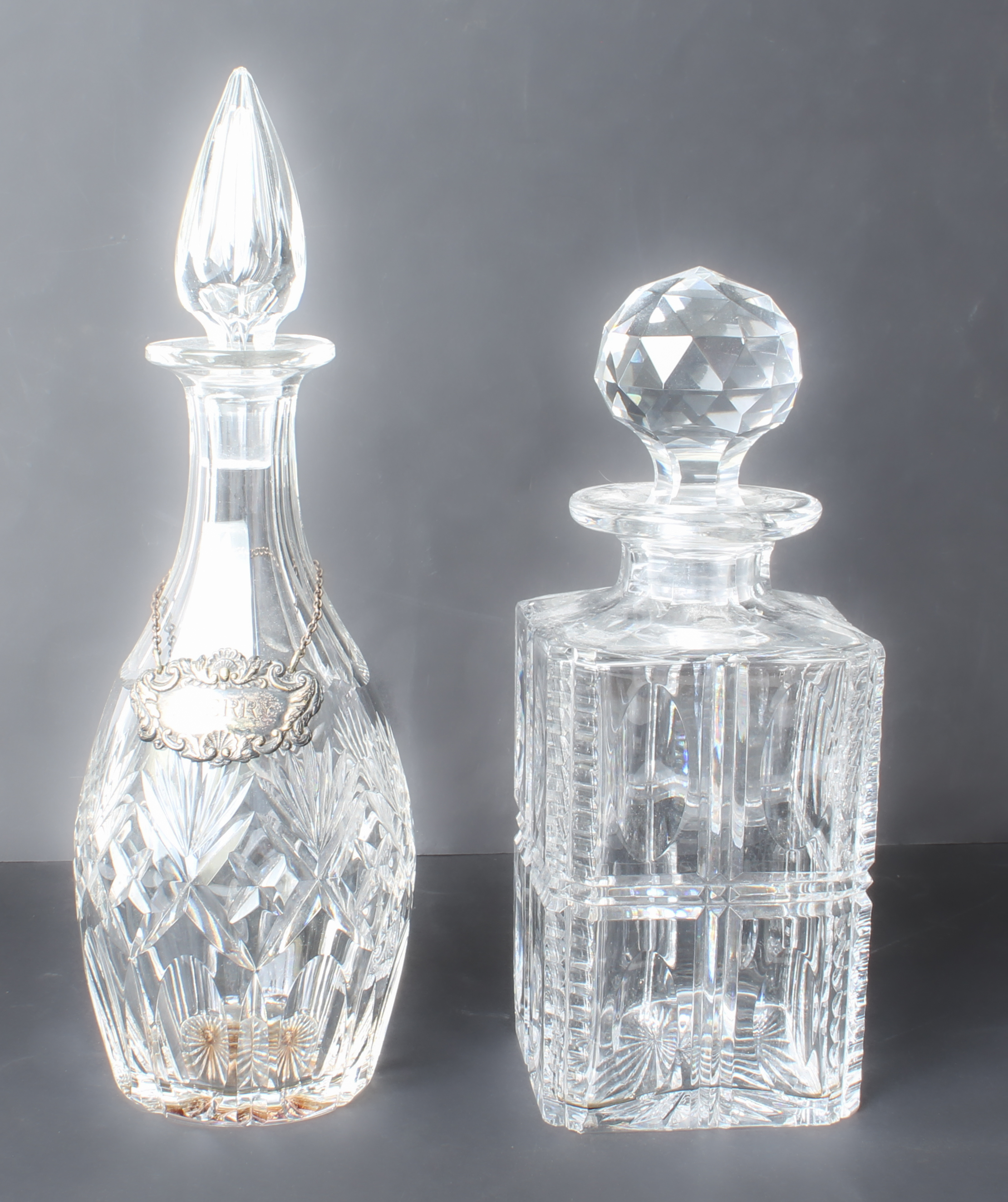 Seven cut glass decanters - a trio of early 20th century square hobnail cut tantalus decanters - Image 4 of 5