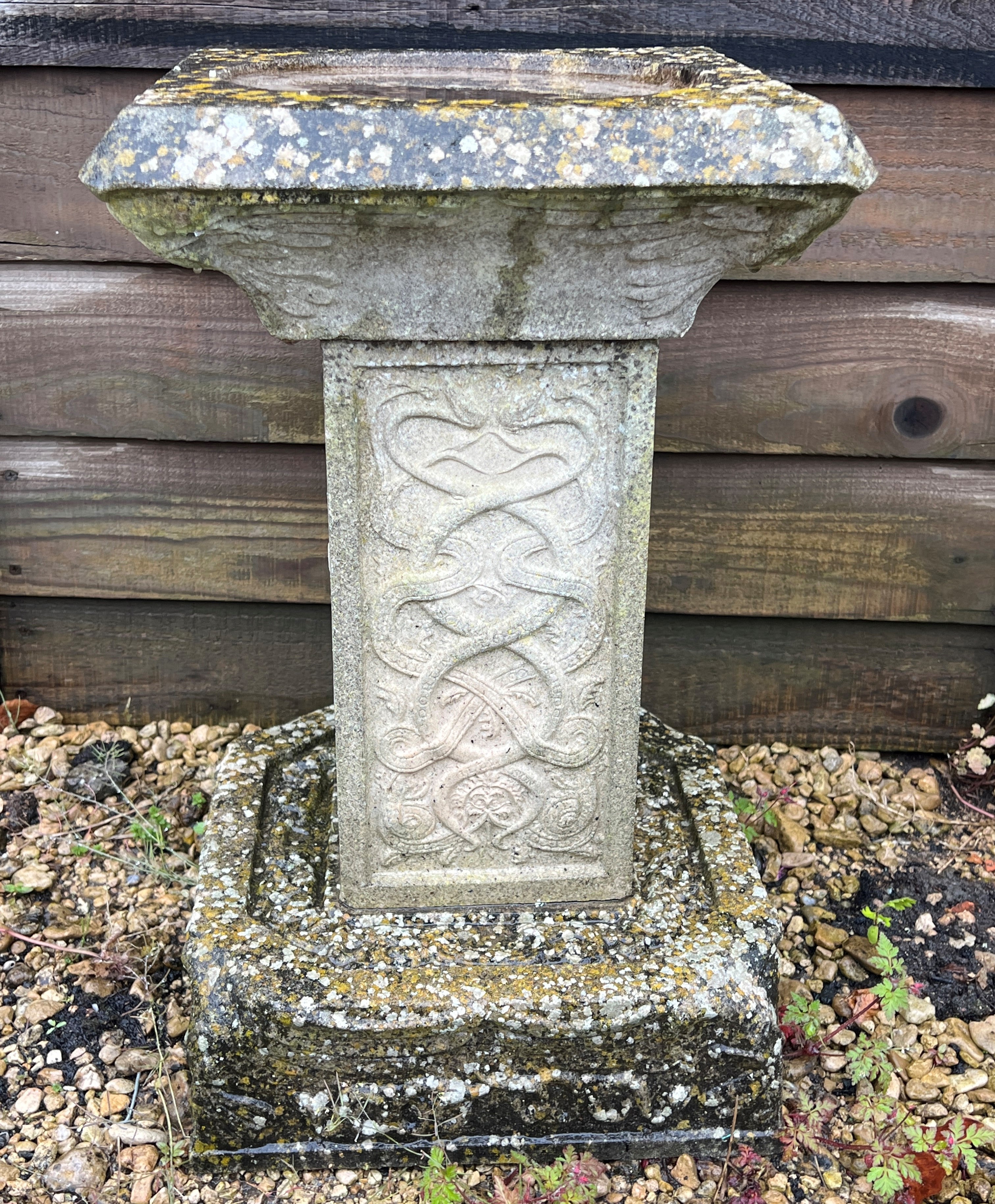 A composite stone square bird bath - the top 32cm square, the base 30cm square, 53cm high.