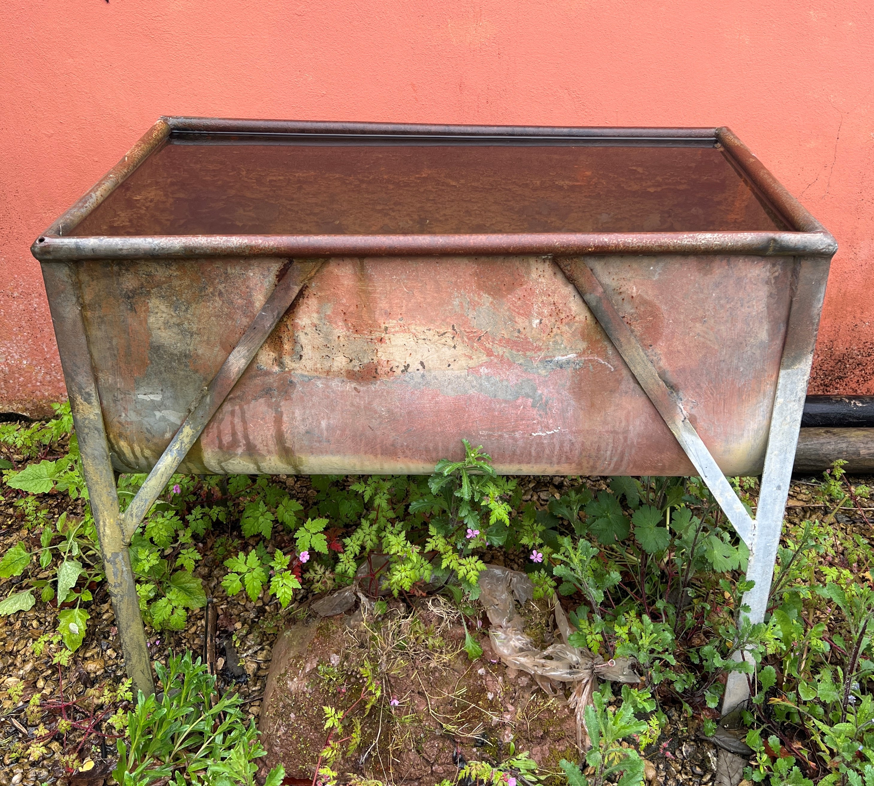 A galvanised metal water trough - with cylinder base, on four legs, 93 x 49cm, 83cm high. - Image 2 of 2