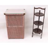 Two  pieces: 1. a mid-century Lloyd Loom style linen box, with glass top and drop-down front