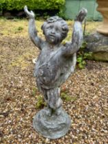 A lead statue of a winged cherub with arms aloft - 69cm high.