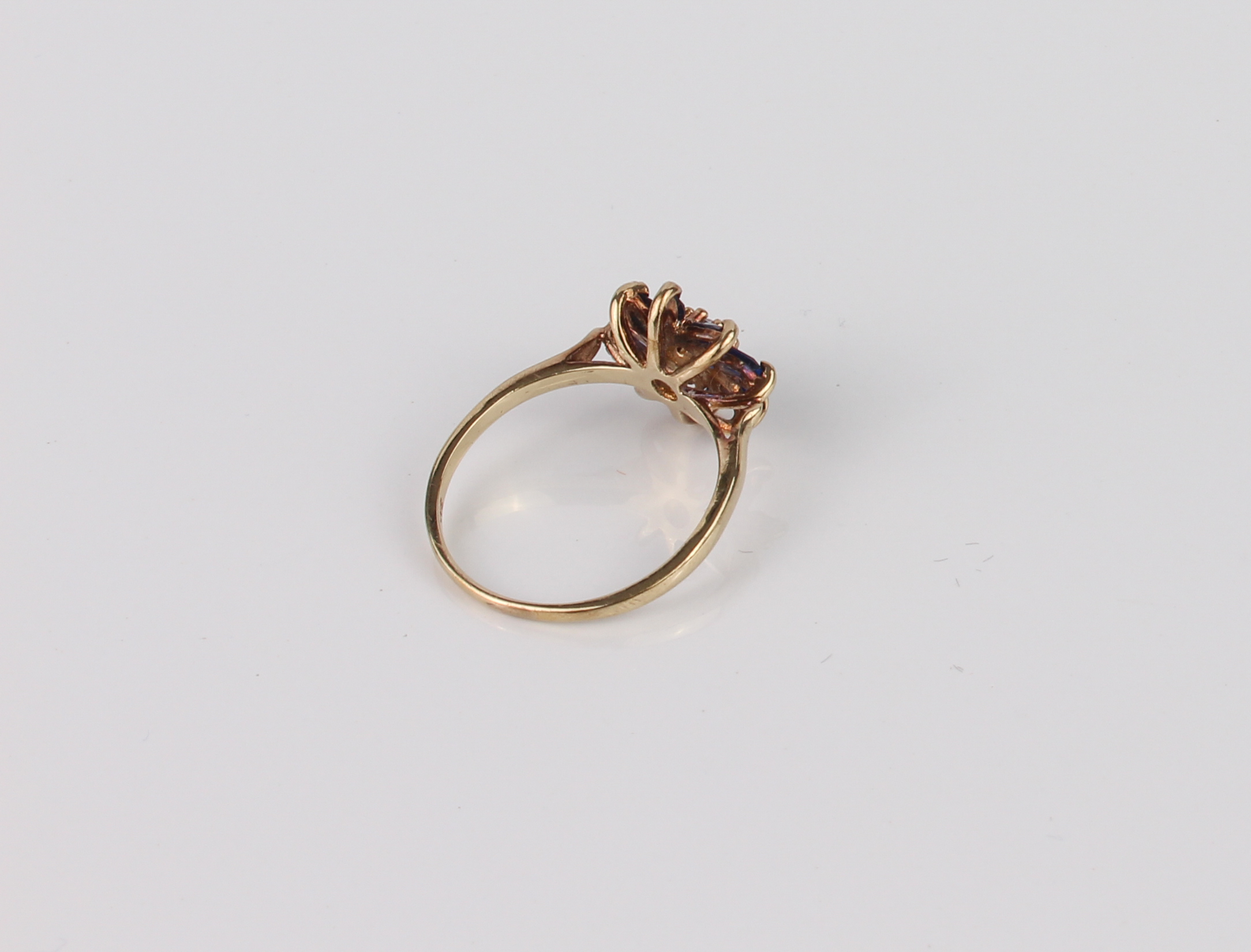 A vintage 9ct yellow gold, blue and white sapphire floral cluster ring - hallmarked London 1970, the - Image 3 of 4