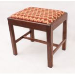 A George III style mahogany rectangular stool - the drop-in seat upholstered in blaze-style